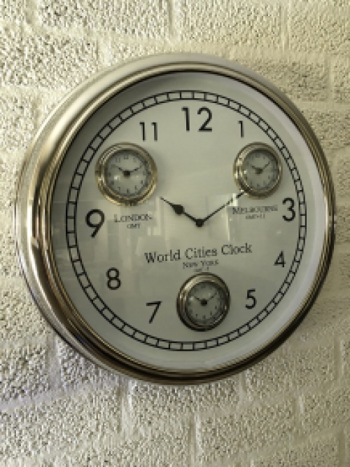 World time clock, chrome version with 4 movements, fantastic timepiece!!