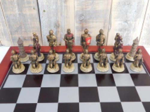 A chess game with the theme: ''MEDIEVAL KNIGHTS'', beautiful chess pieces as medieval knights