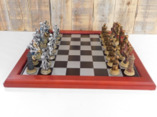 A chess game with the theme: ''MEDIEVAL KNIGHTS'', beautiful chess pieces as medieval knights