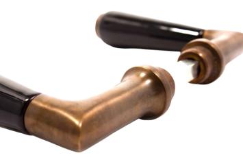 Pair of door handles, brass patinated, classic