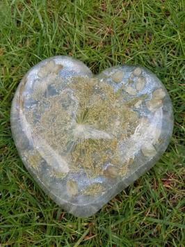 Beautiful flowers cast in epoxy resin heart