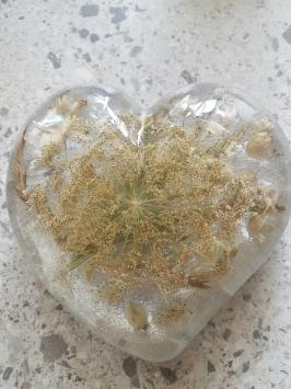 Beautiful flowers cast in epoxy resin heart