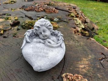 tomb statue in a heart with angel