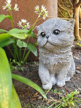 Cat with ball, concrete statue