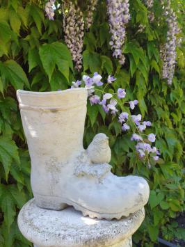 Flower pot as an old boot, flower box
