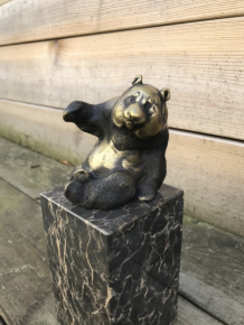 A bronze statue/sculpture of a sitting panda, on a beautiful large base!