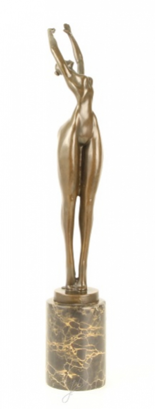 A bronze statue/sculpture of an artistic naked woman