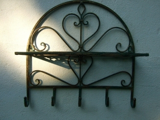 Wall shelf coat rack made of wrought iron